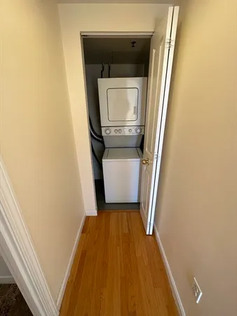 a kitchen with granite countertop a stove and a sink