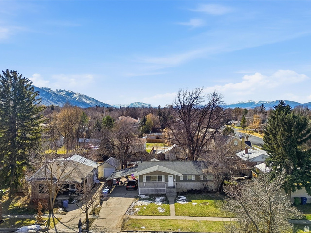 322 East 900 North Logan, UT 84321 - Photo 32 of 43 Aerial view of residential area featuring a mountain backdrop