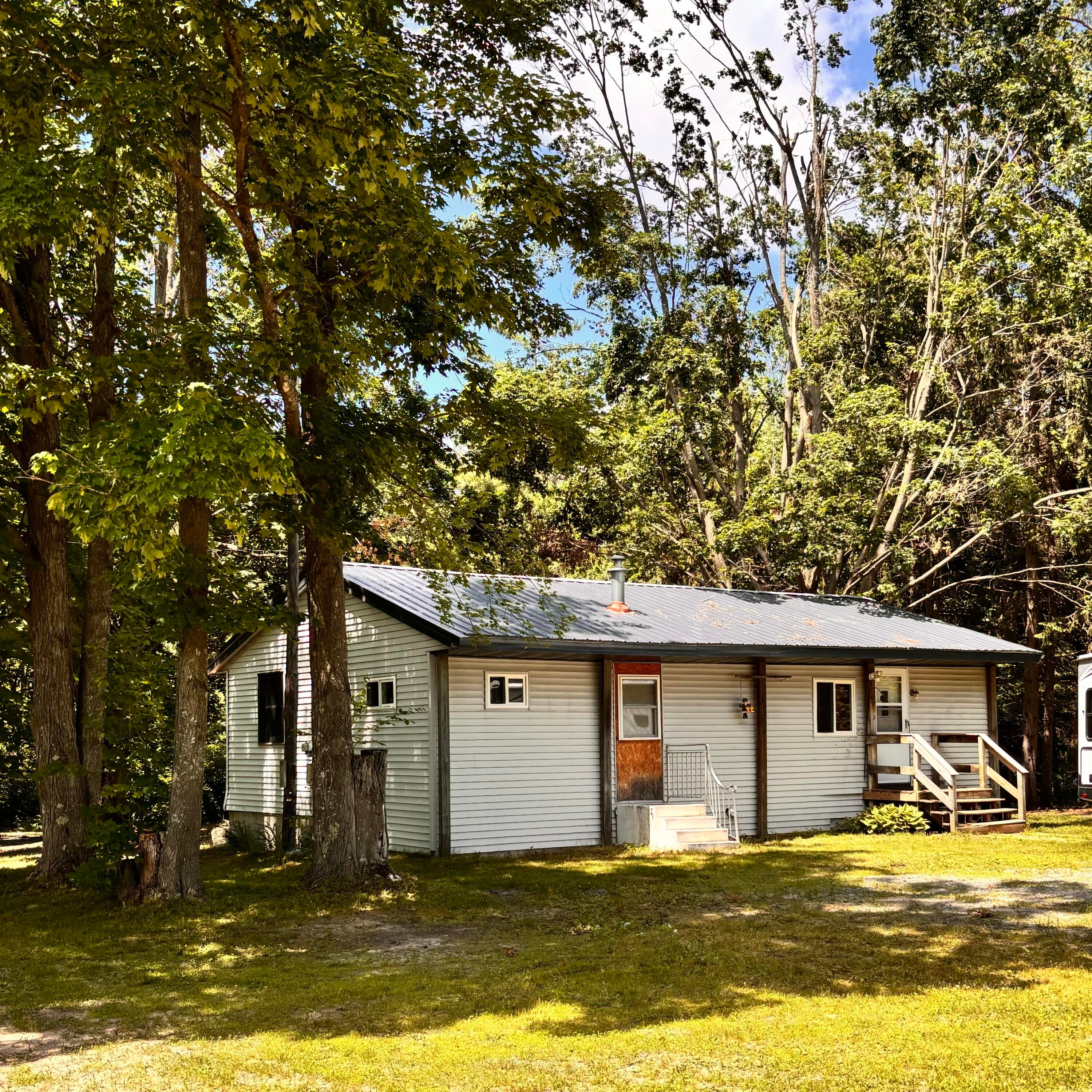 10279 North Sherman Road Frederic, MI 49733 - Photo 1 of 32 outside of home 2