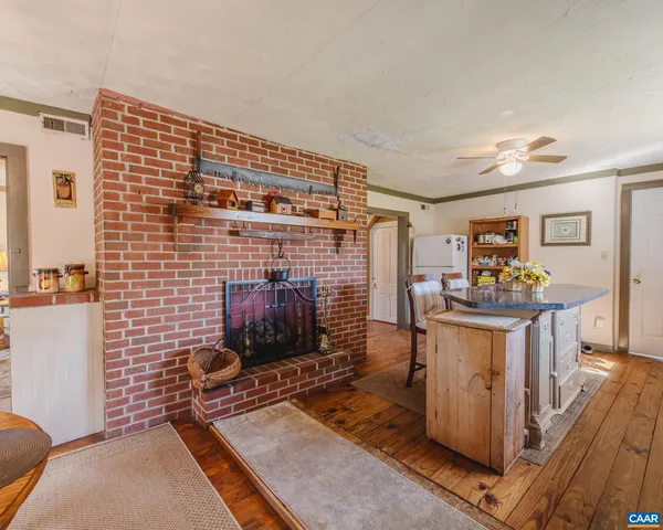 a view of a living room and dining room