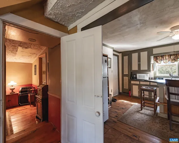 a bed room with a bed and a chandelier