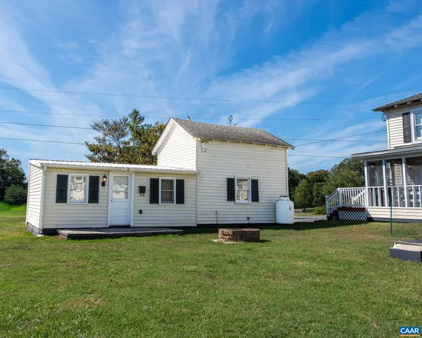 a view of living room with a large window