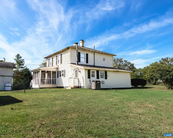 a view of a house with a big yard