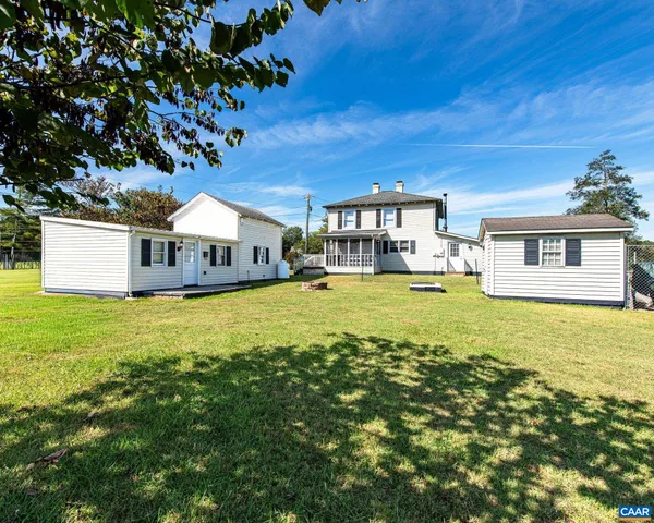 a view of a house with a big yard