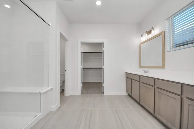 a view of an empty walk in closet