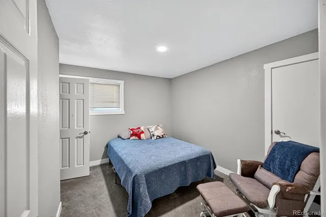 a room with furniture and a window