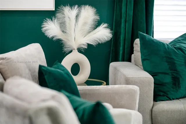 a close view of sink and a potted plant