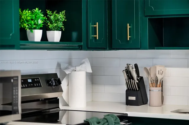 a flower with a vase of flowers sitting on a table