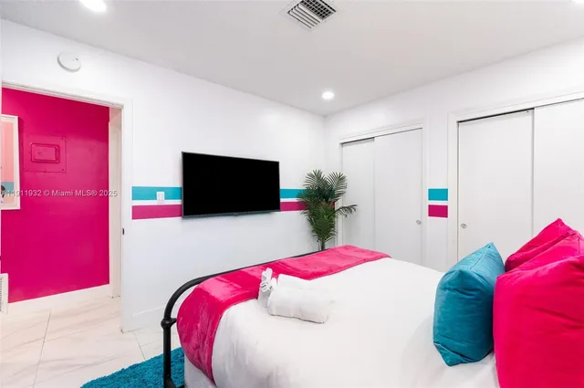 a view of a workspace with furniture