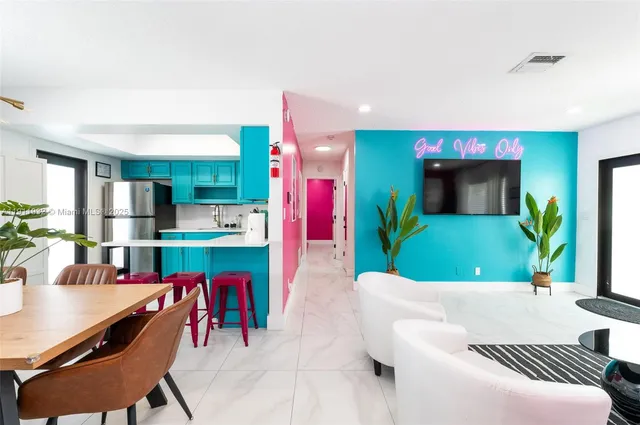a kitchen with cabinets and wooden cabinets