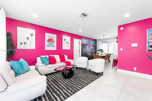 a kitchen with stainless steel appliances granite countertop a refrigerator stove and microwave