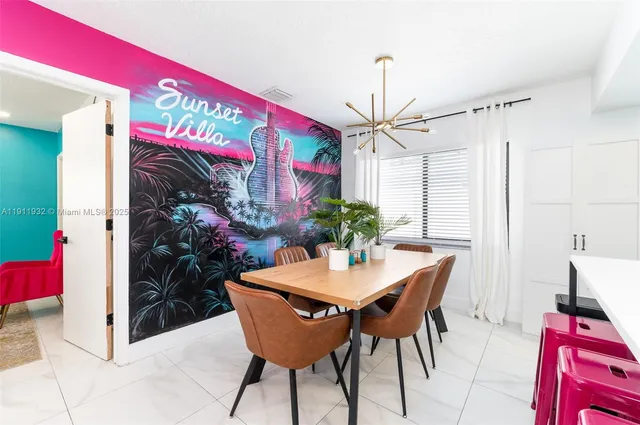 a bedroom with large bed and a large window