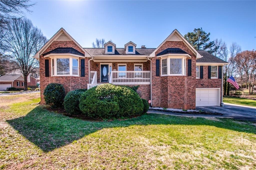 601 Pecanwood Road Charlotte, NC 28214 - Photo 1 of 1 a front view of a house with a yard