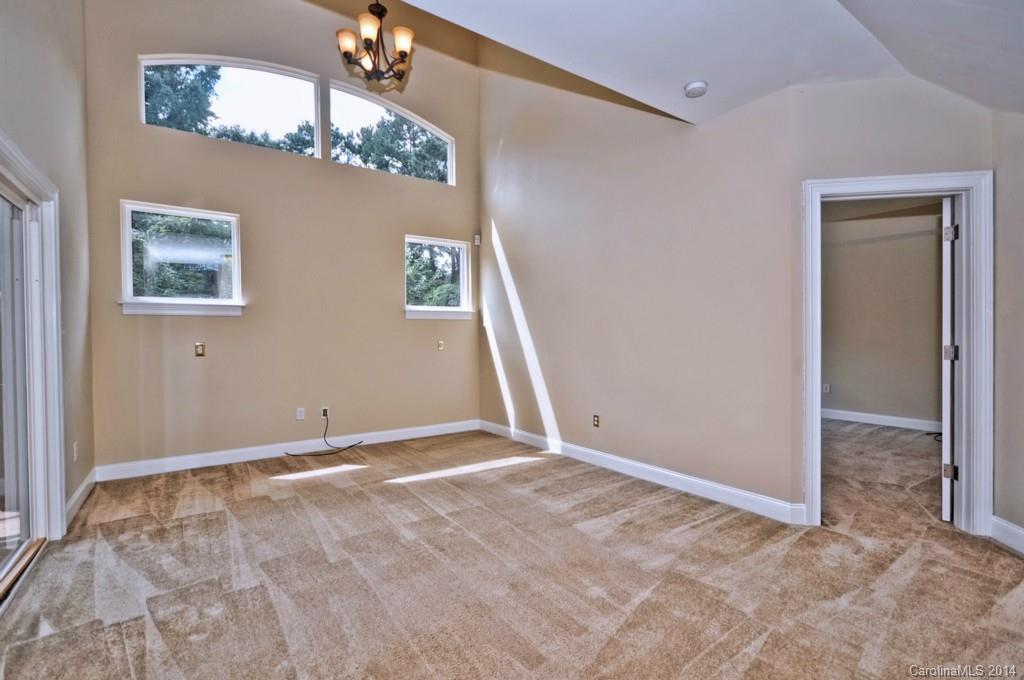 901 McAlway Road Charlotte, NC 28211 - Photo 11 of 24 a view of an empty room with a window