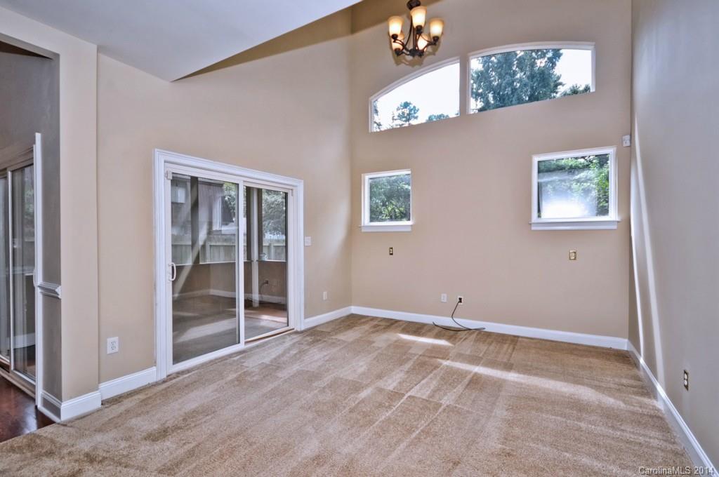 901 McAlway Road Charlotte, NC 28211 - Photo 12 of 24 an empty room with windows