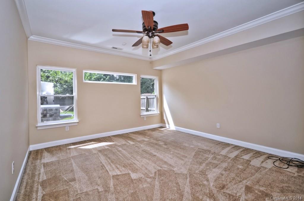 901 McAlway Road Charlotte, NC 28211 - Photo 17 of 24 a view of room with window and ceiling fan