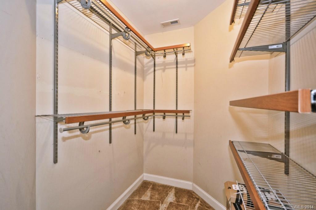 901 McAlway Road Charlotte, NC 28211 - Photo 18 of 24 a view of staircase with a rug