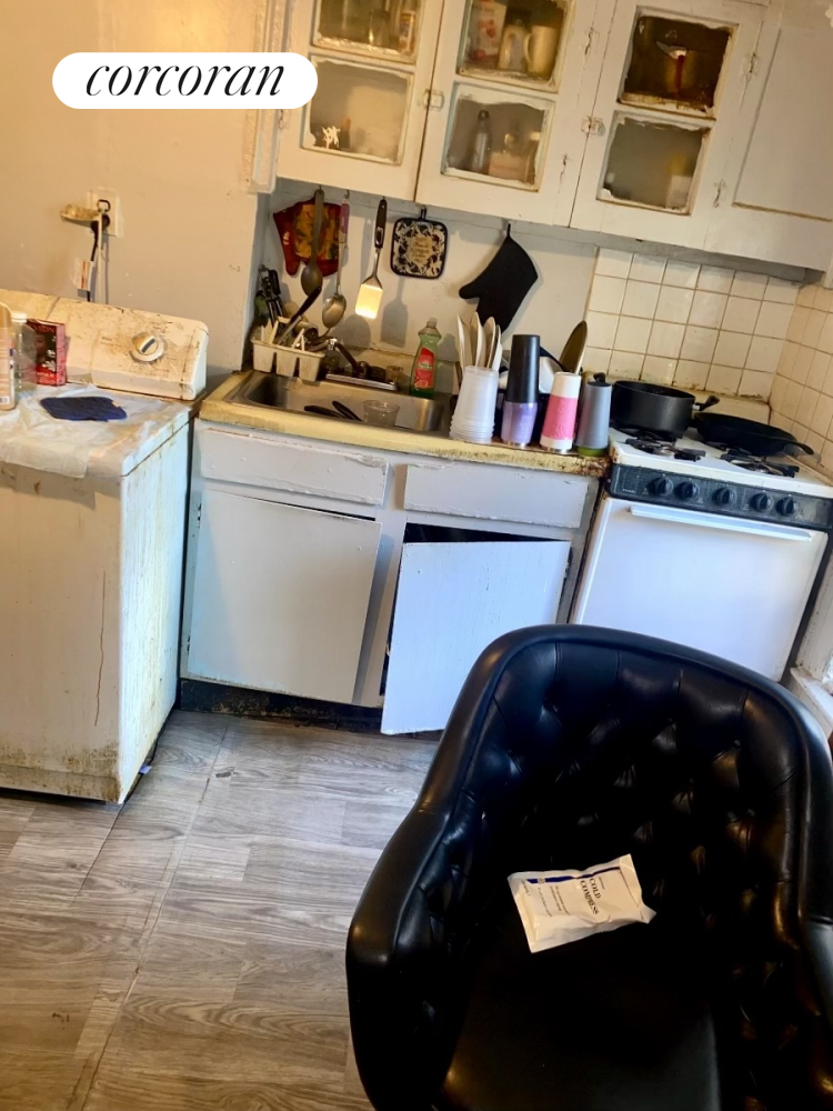 116 4th Avenue Brooklyn, NY 11217 - Photo 17 of 17 a kitchen with a sink and cabinets