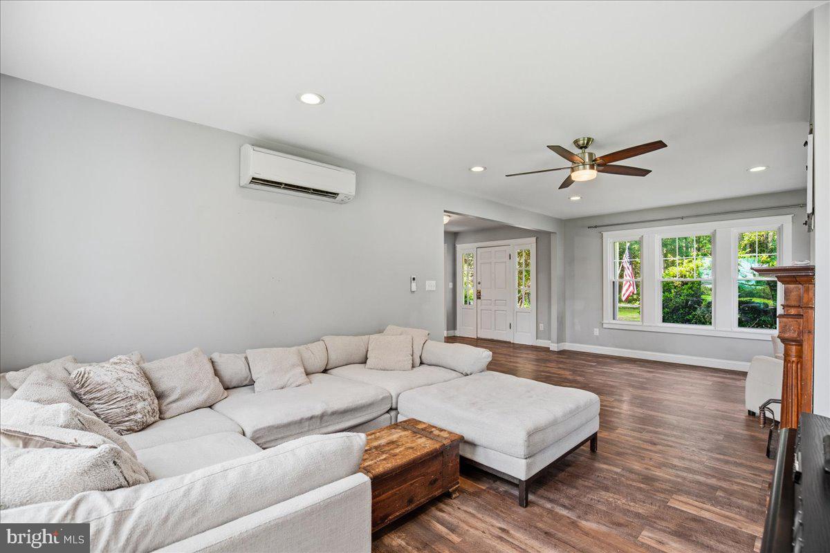 16146 Thomas Road Piney Point, MD 20674 - Photo 29 of 70 a living room with furniture and a large window