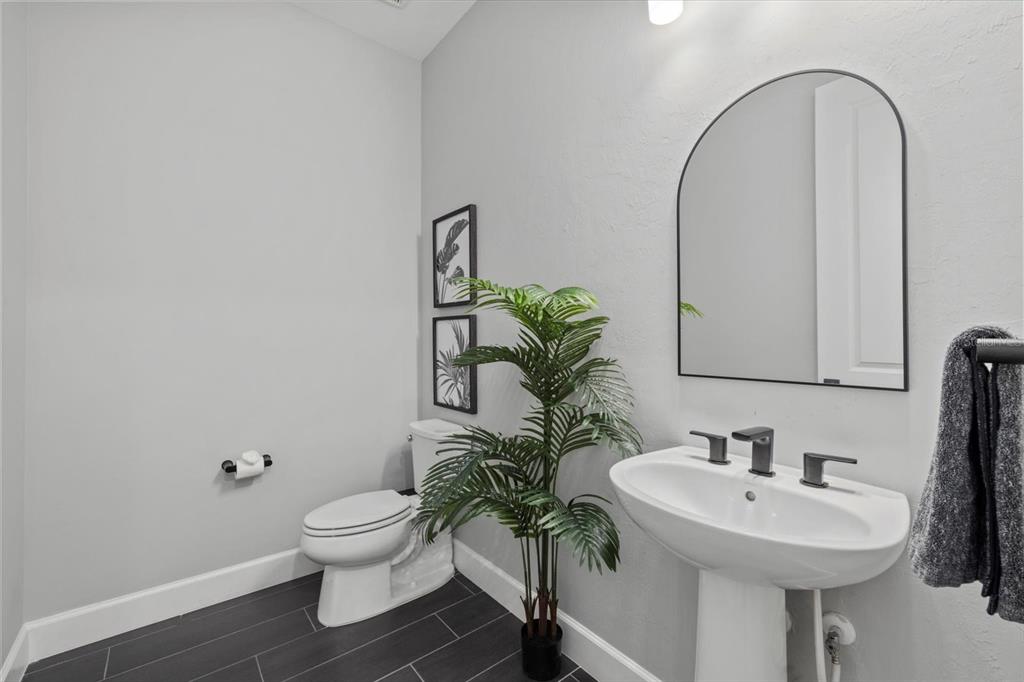 3508 Anchor Bay Trail Lakewood Ranch, FL 34211 - Photo 7 of 74 a bathroom with a sink toilet and a mirror
