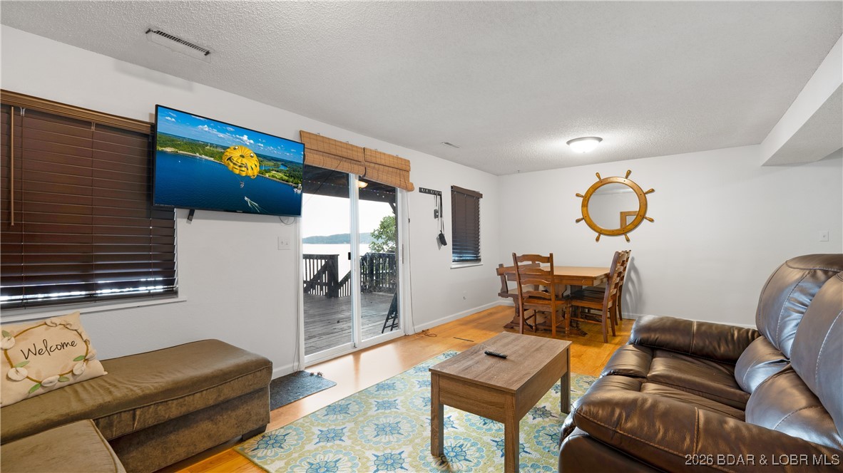 2859 Twin Rivers Point Camdenton, MO 65020 - Photo 4 of 30 Sliders open to a large partially covered deck