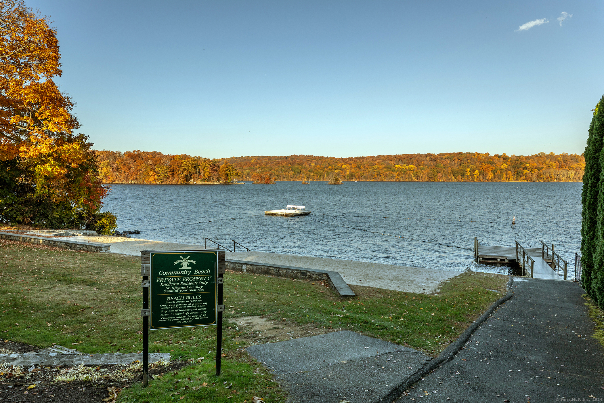 5 Windmill Road New Fairfield, CT 06812 - Photo 34 of 37 a view of a lake with a garden