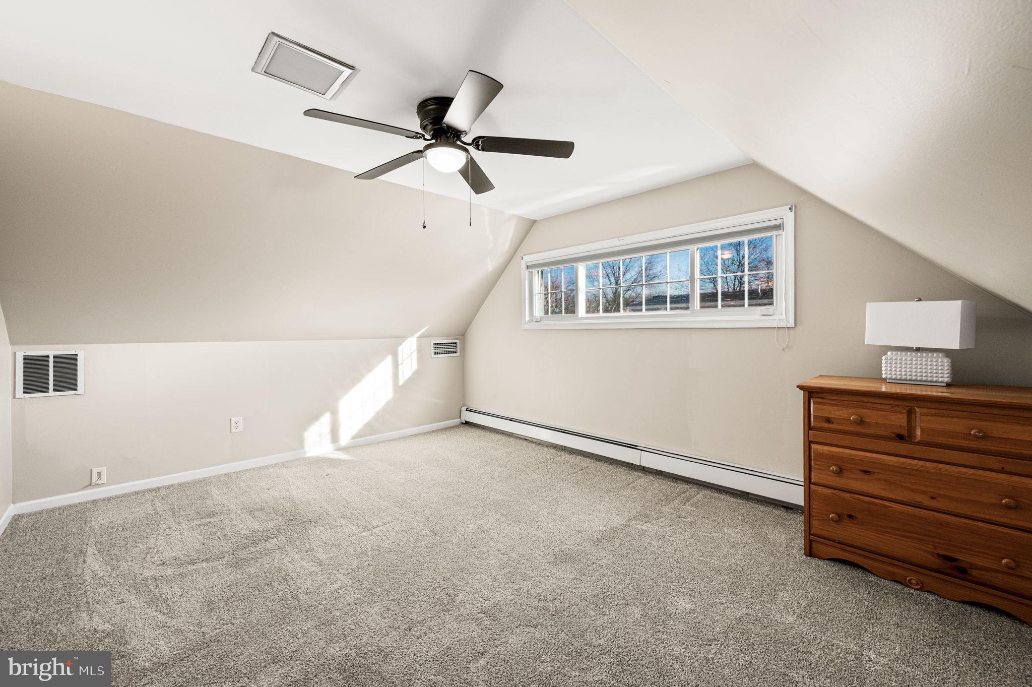 29 Spindletree Road Levittown, PA 19056 - Photo 24 of 29 a view of a livingroom with a ceiling fan and window