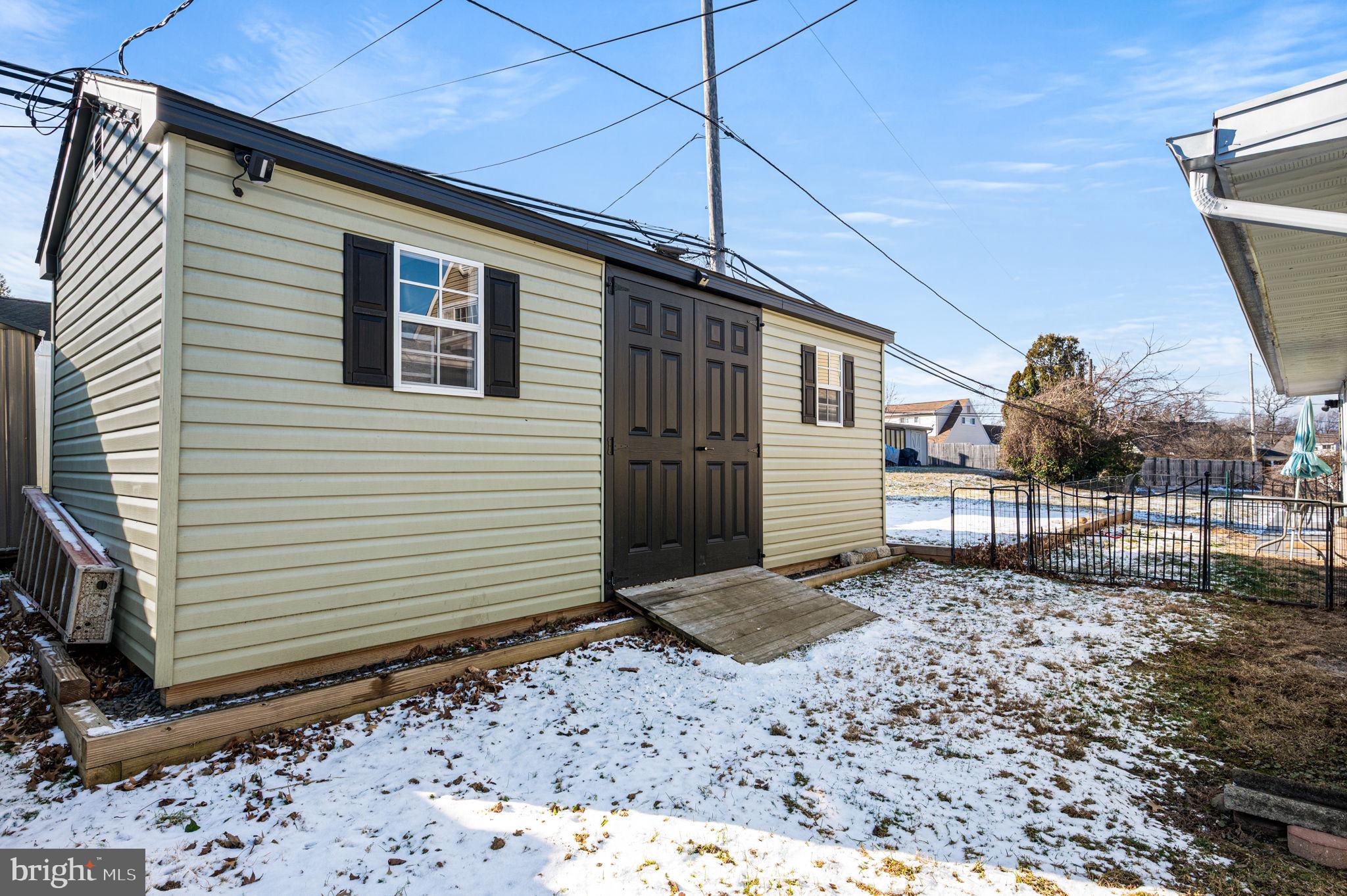 29 Spindletree Road Levittown, PA 19056 - Photo 29 of 29 a view of a house with a yard