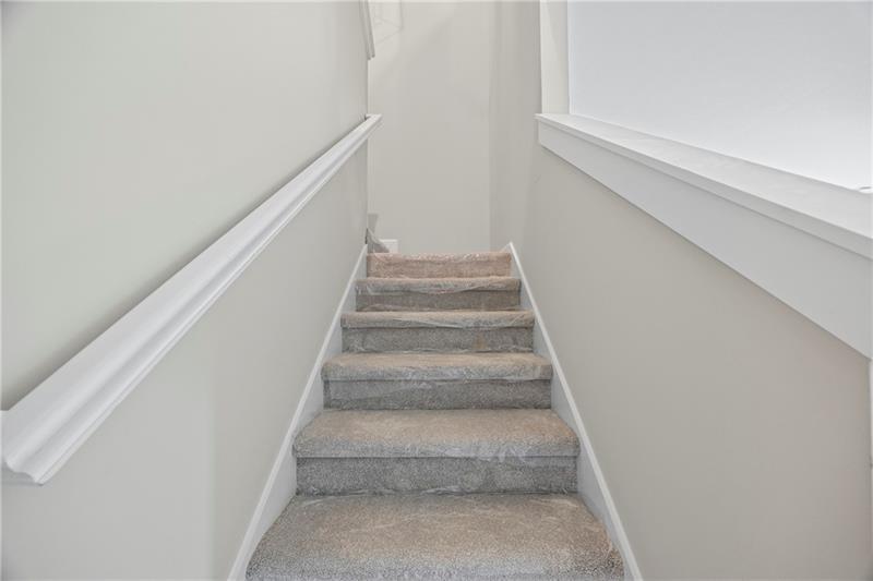 613 Racetrack Road Toccoa, GA 30577 - Photo 34 of 47 a view of staircase with white walls