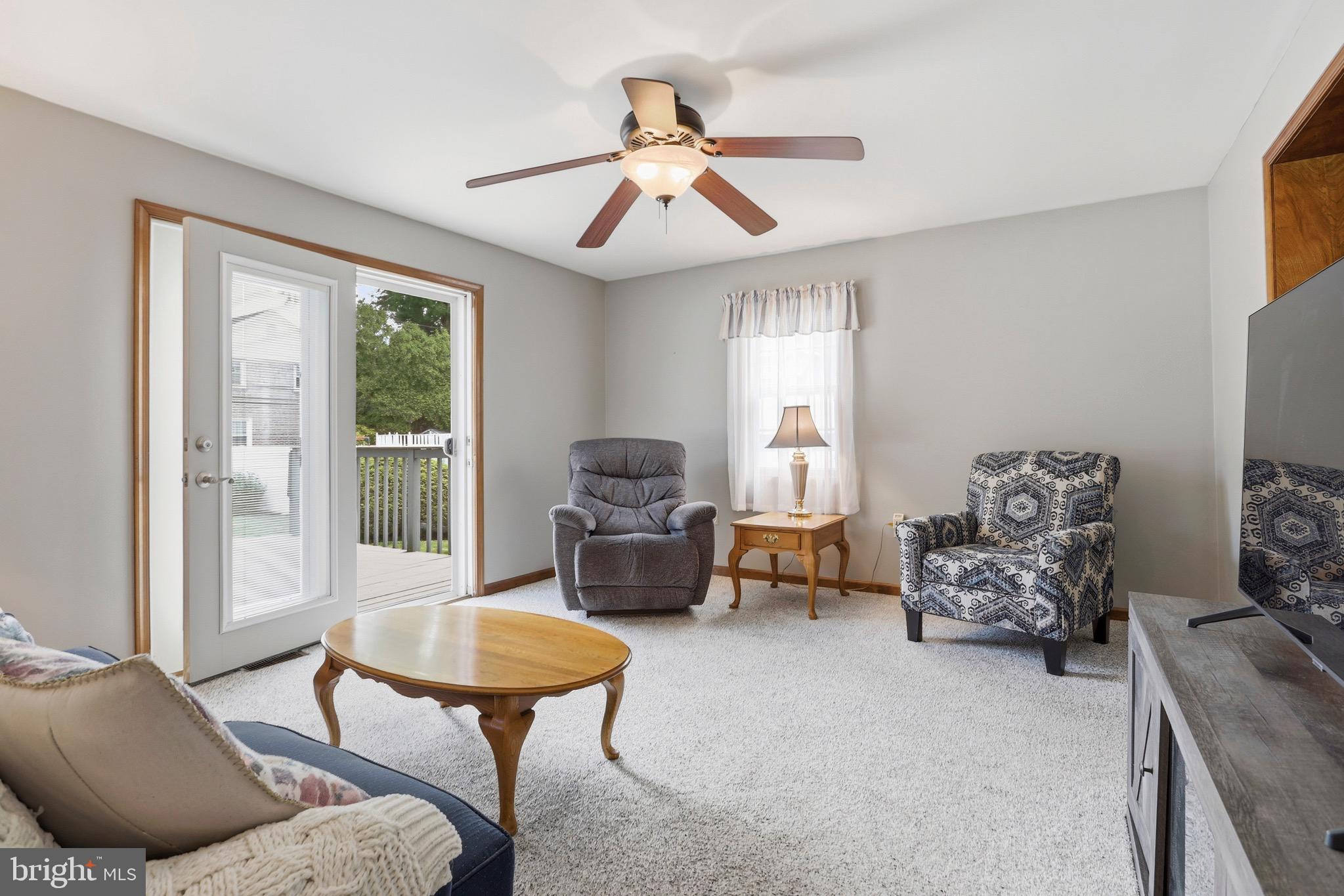 527 Saxer Avenue Springfield, PA 19064 - Photo 17 of 33 a living room with furniture and a large window
