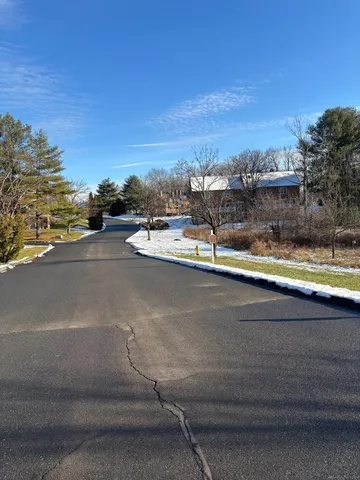 a view of swimming pool with outdoor seating and city view