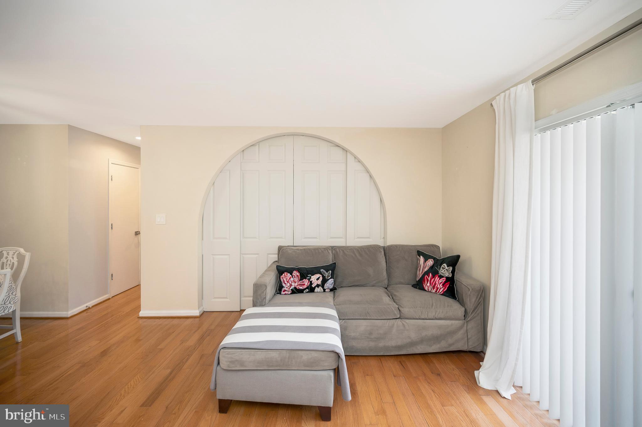 41 Smokewood Court, Unit 200 Stafford, VA 22554 - Photo 31 of 40 a living room with furniture and wooden floor