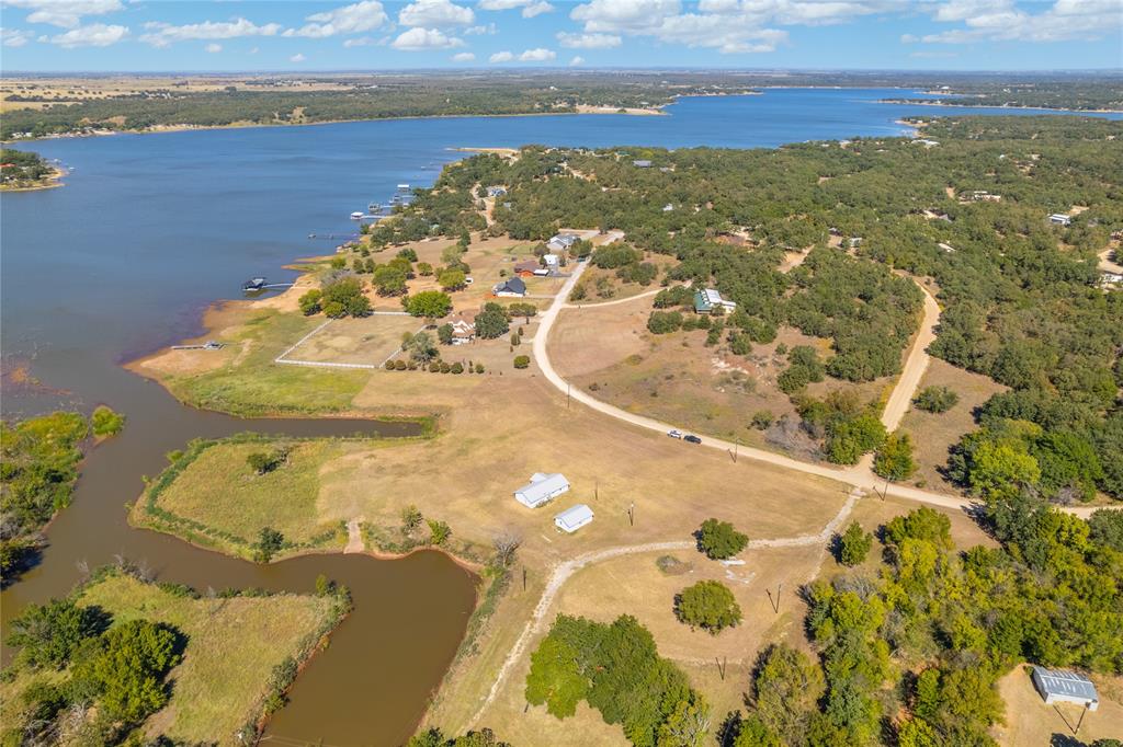 180 Comanche Trail Nocona, TX 76255 - Photo 3 of 8 a view of a lake with a mountain