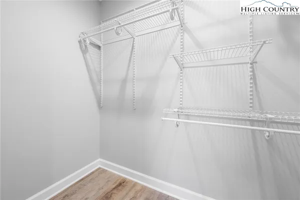 a view of a room with racks on the wall