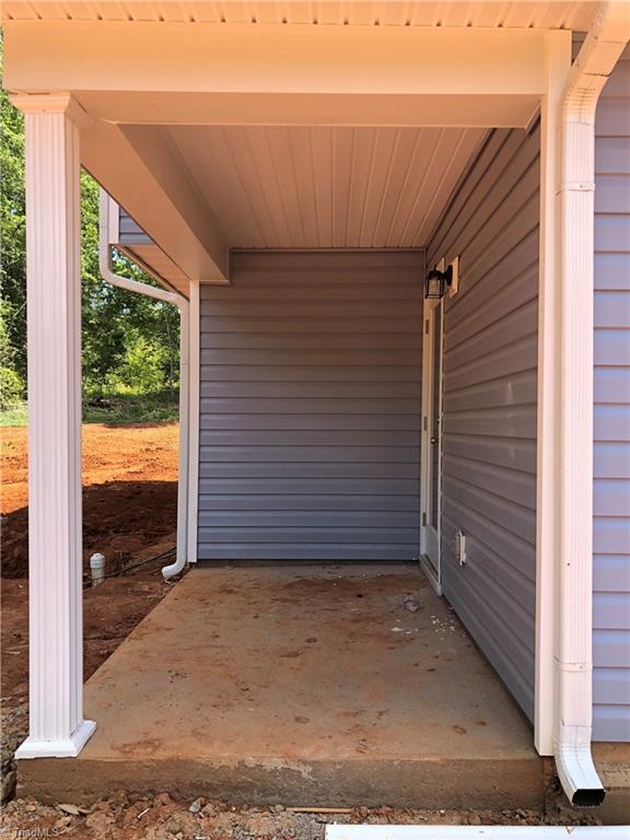 2121 Bethania-Rural Hall Road Pfafftown, NC 27040 - Photo 8 of 21 rear covered patio