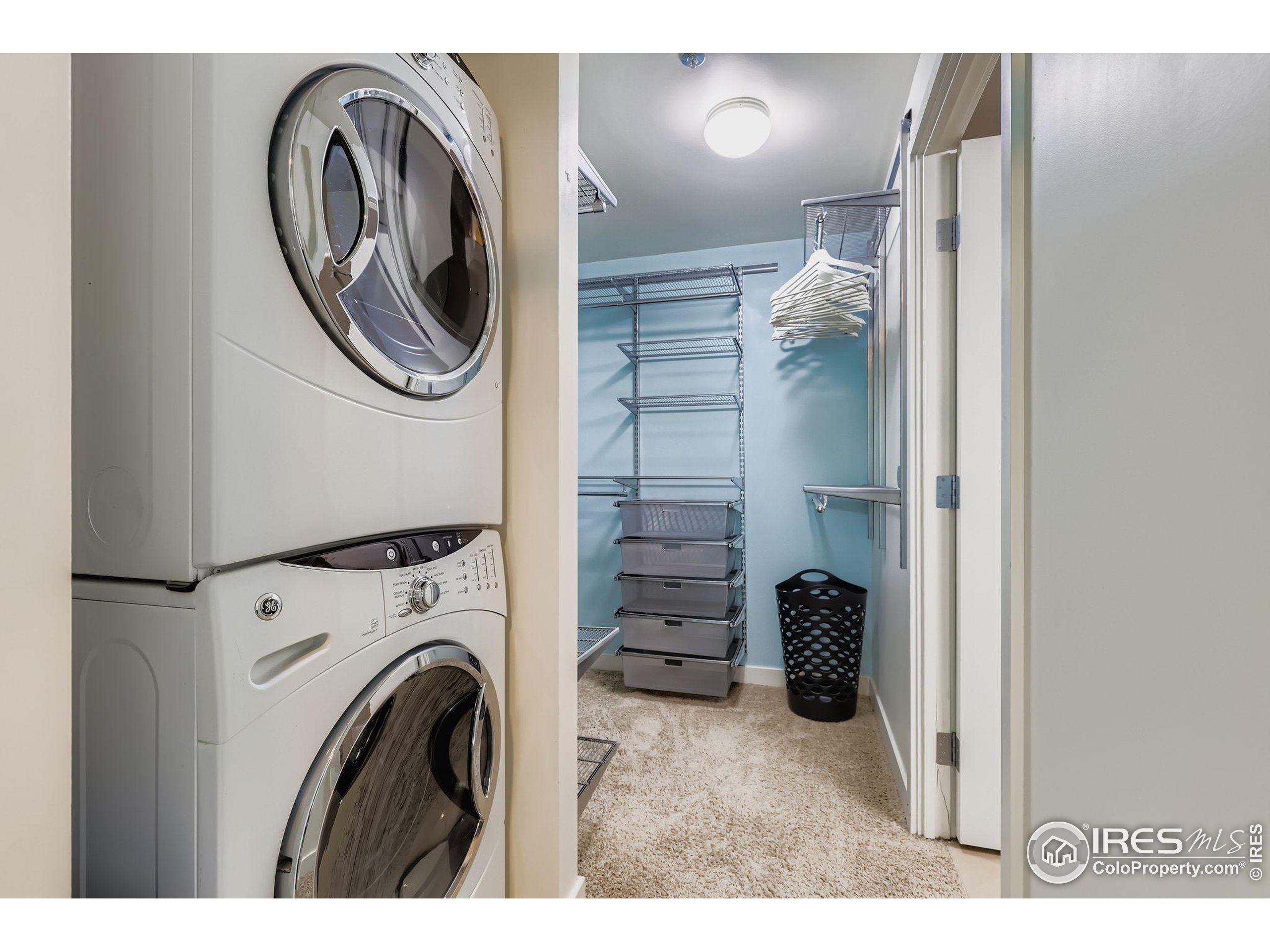891 14th Street, Unit 1111 Denver, CO 80202 - Photo 14 of 38 a view of a storage and utility room with washer and dryer