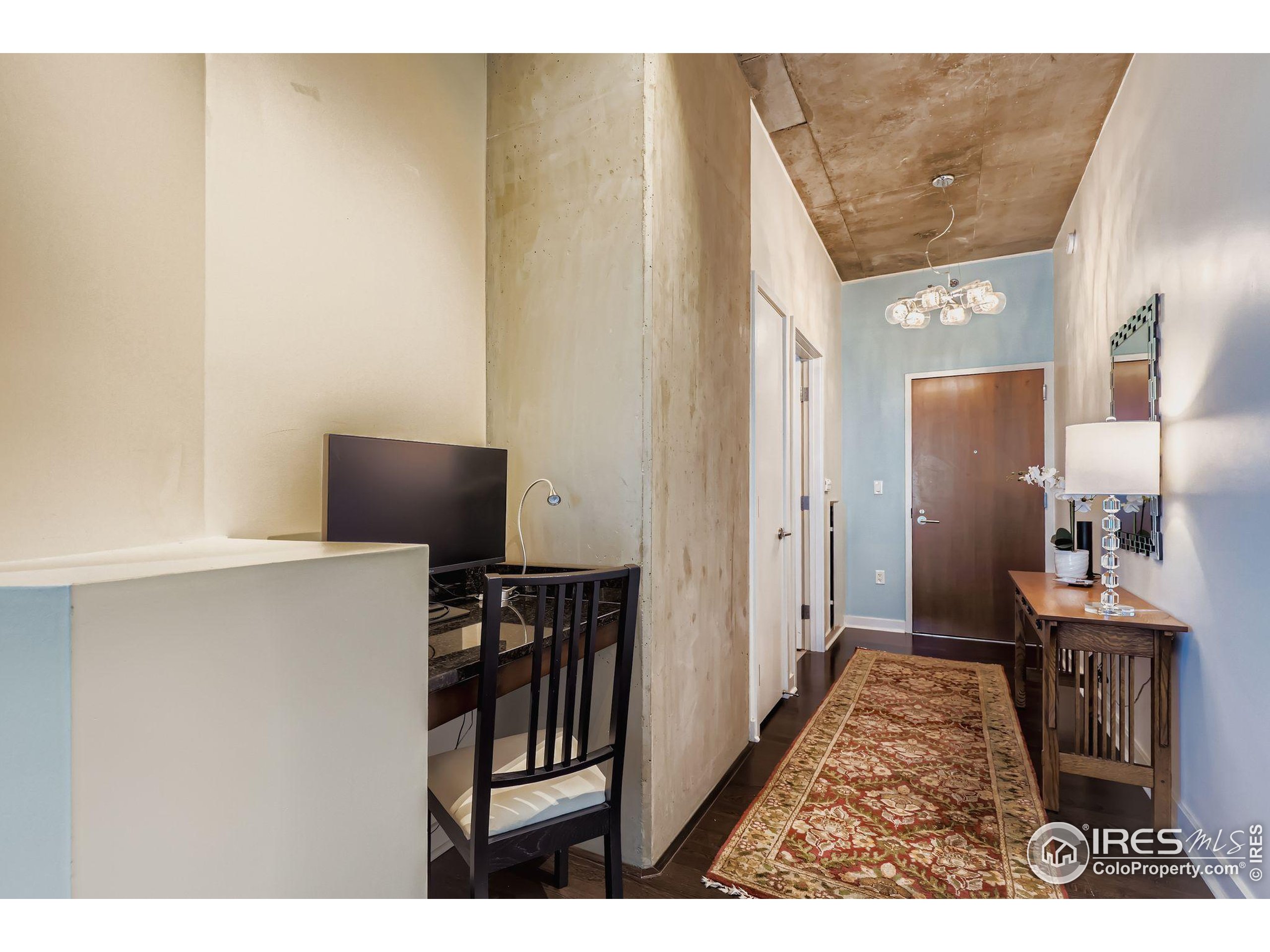 891 14th Street, Unit 1111 Denver, CO 80202 - Photo 16 of 38 a view of a hallway with workspace