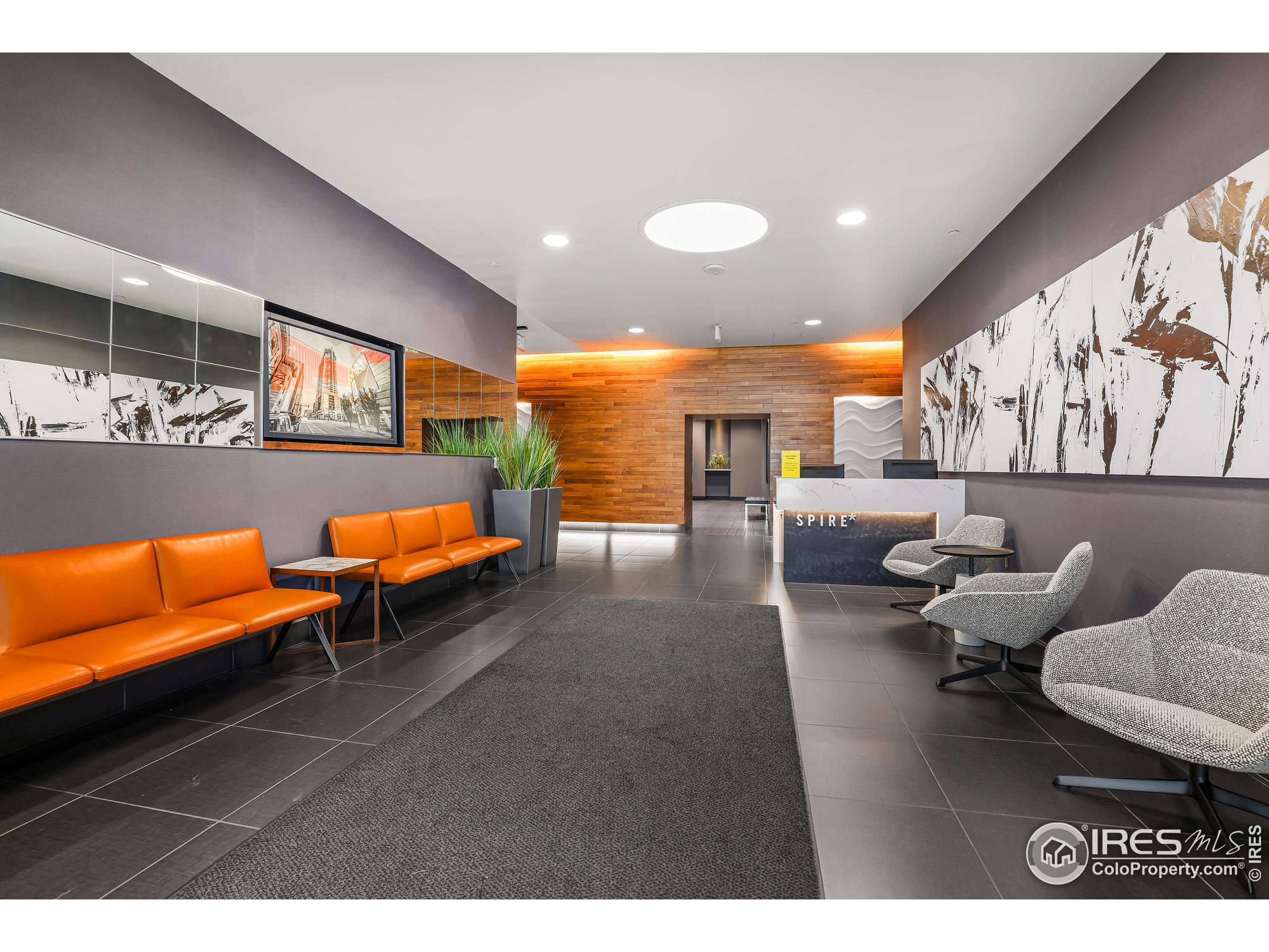 891 14th Street, Unit 1111 Denver, CO 80202 - Photo 20 of 38 a living room with furniture and a flat screen tv