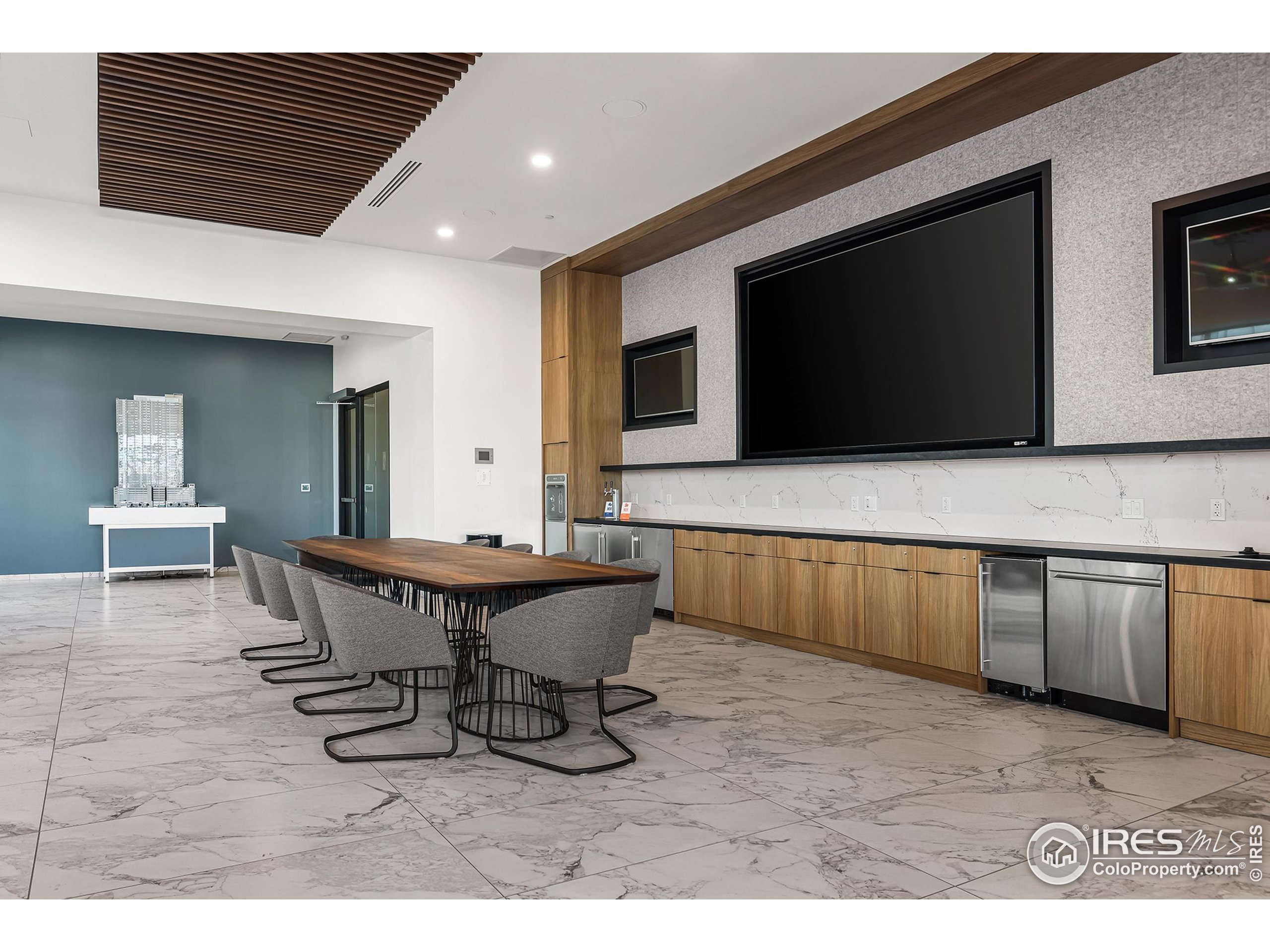 891 14th Street, Unit 1111 Denver, CO 80202 - Photo 21 of 38 a living room with a couch and a flat screen tv