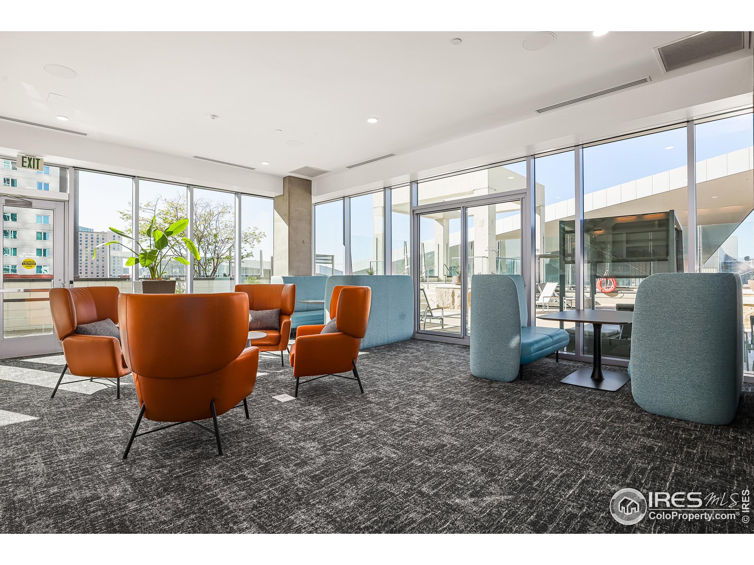 891 14th Street, Unit 1111 Denver, CO 80202 - Photo 26 of 38 a living room with furniture and a floor to ceiling window