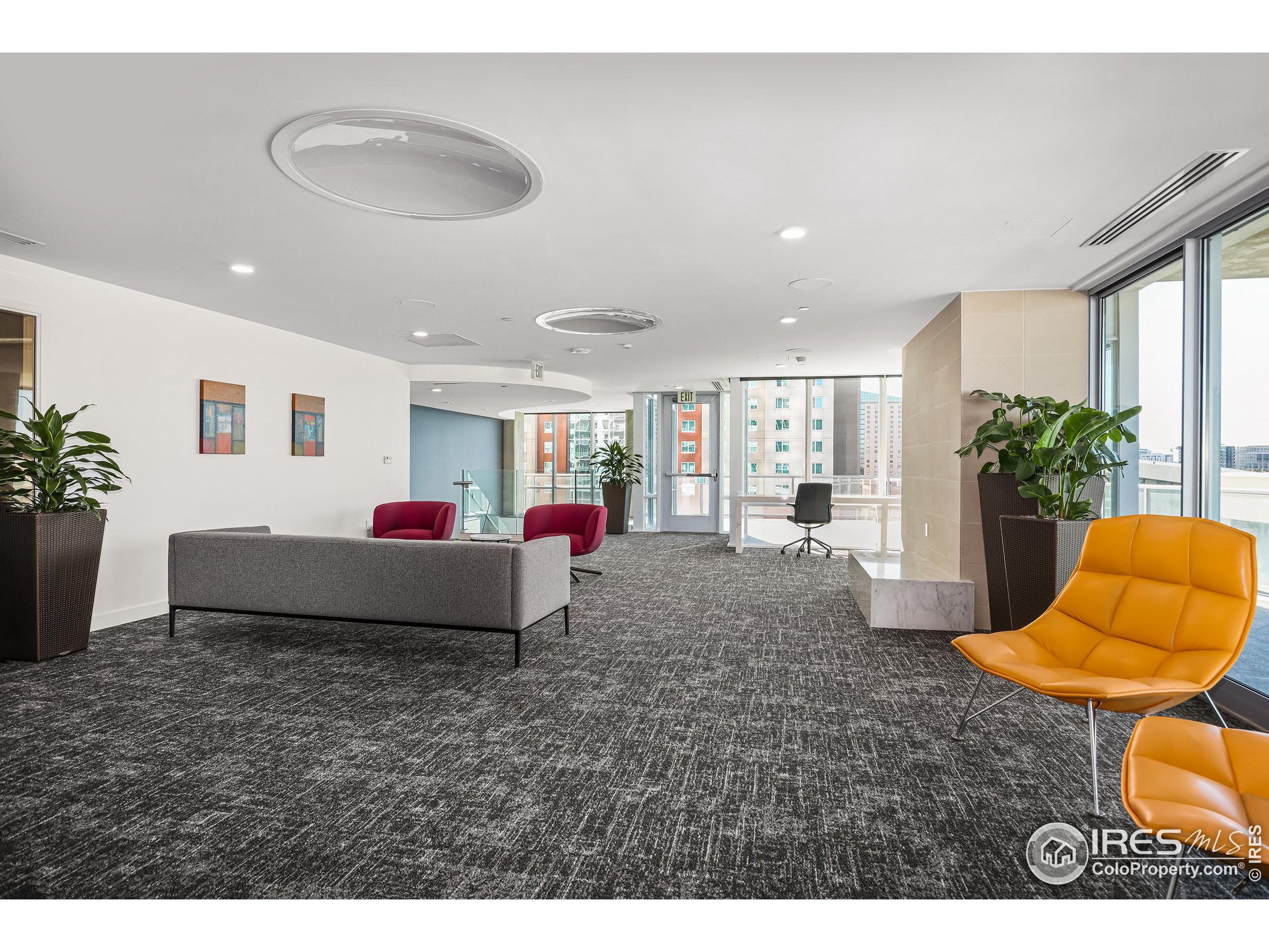 891 14th Street, Unit 1111 Denver, CO 80202 - Photo 29 of 38 a living room with furniture and a potted plant
