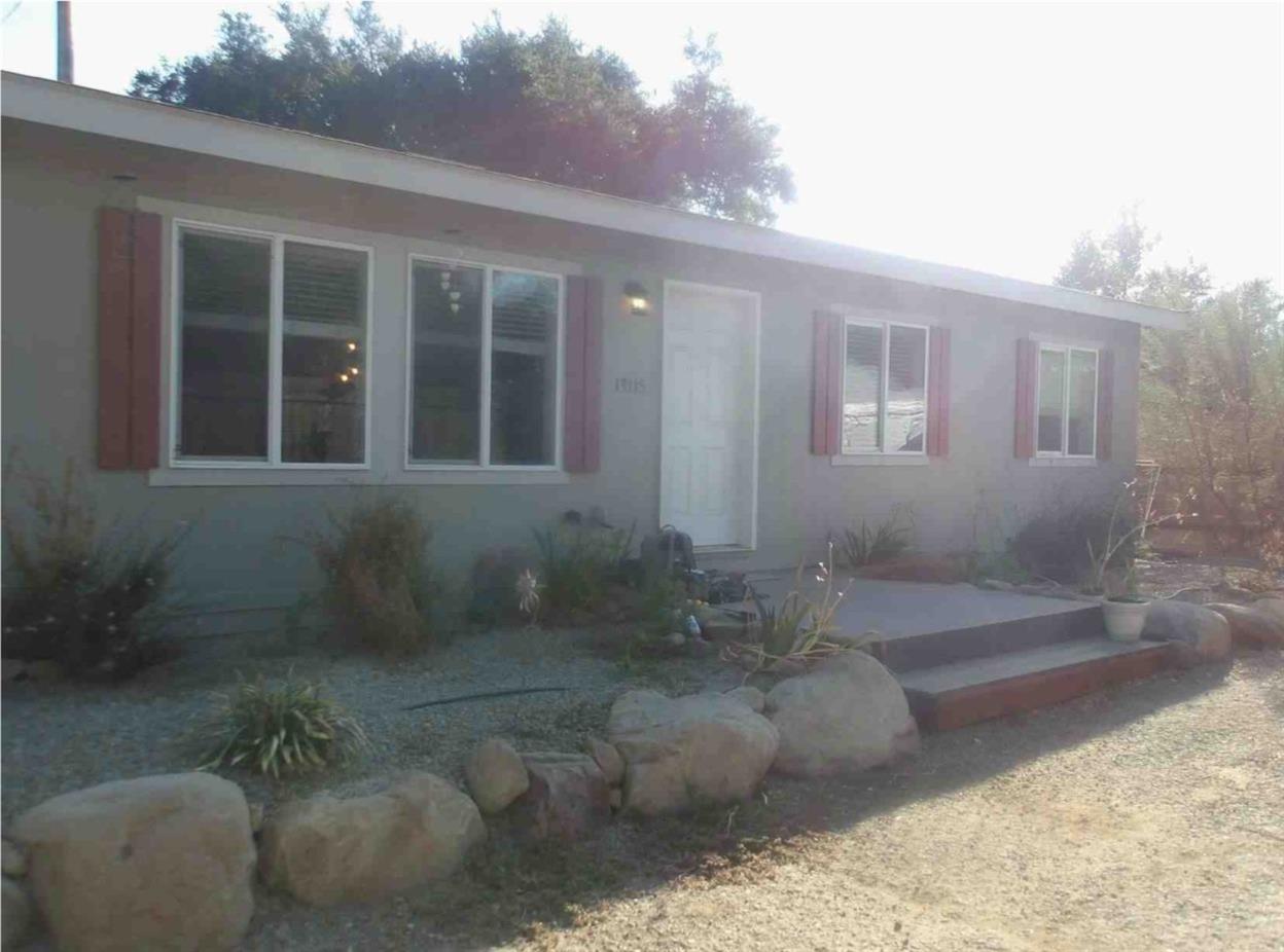 13115 Ojai Road Santa Paula, CA 93060 - Photo 1 of 1 a view of a house with a backyard