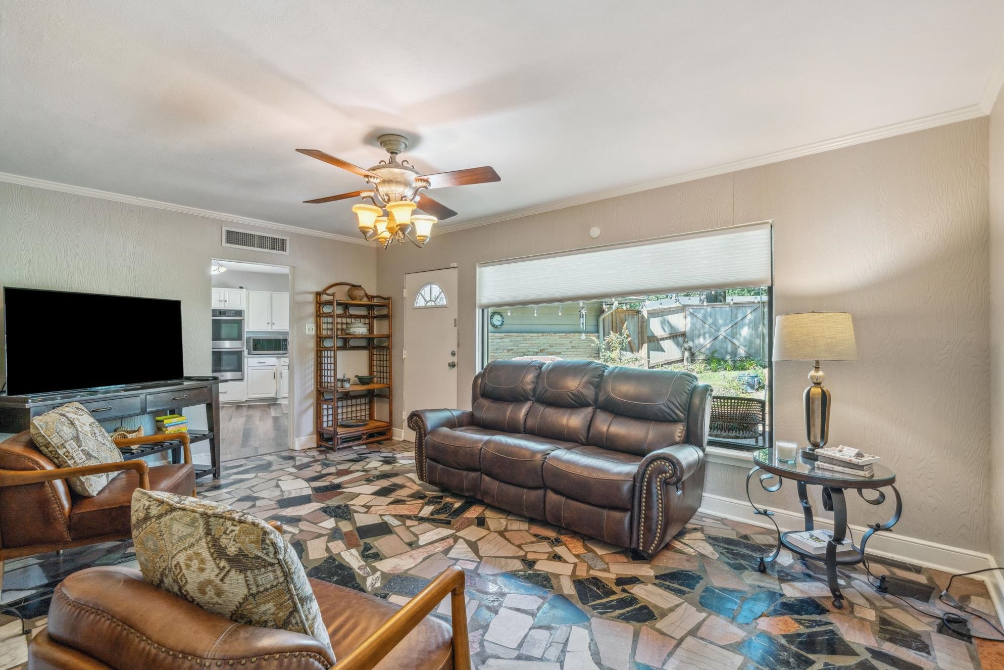 212 North Rose Road Memphis, TN 38117 - Photo 5 of 18 Woodburning fireplace and great view of patio