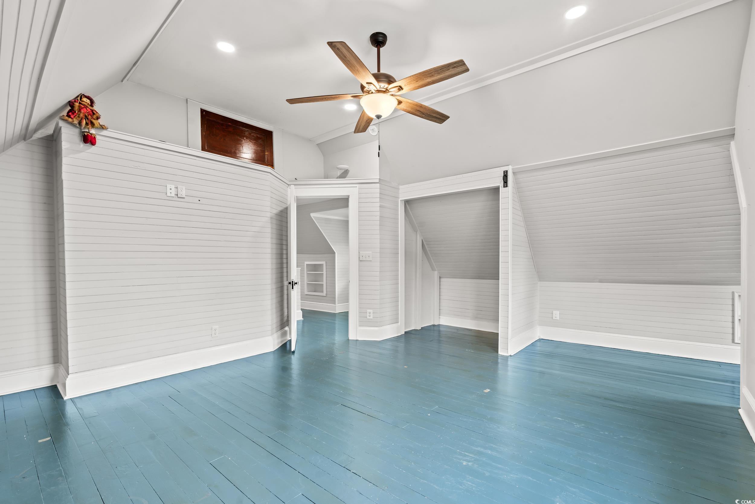 4842 Main Street Loris, SC 29569 - Photo 18 of 40 Interior space with vaulted ceiling, dark hardwood