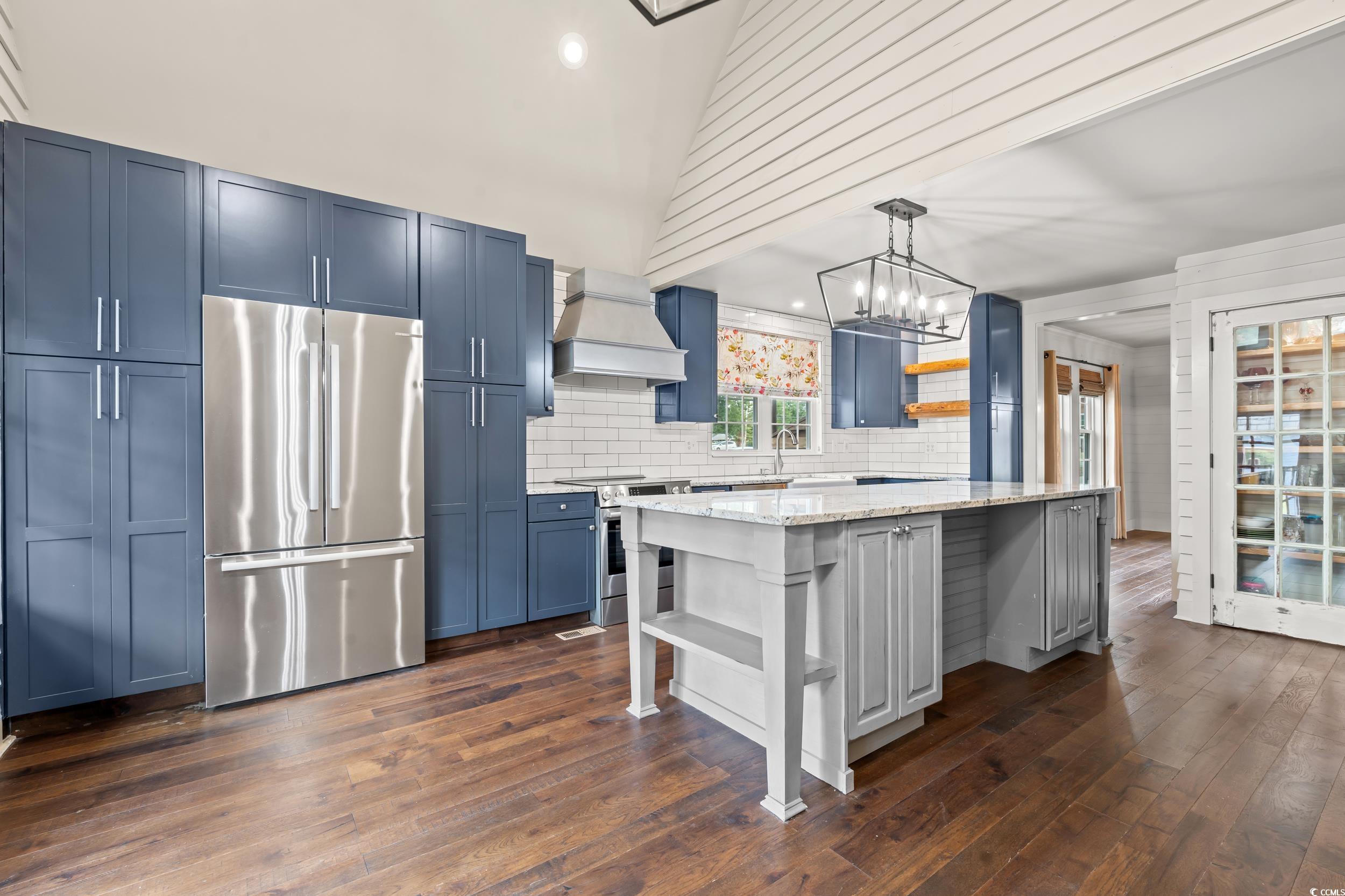 4842 Main Street Loris, SC 29569 - Photo 4 of 40 Kitchen featuring blue cabinetry, stainless steel