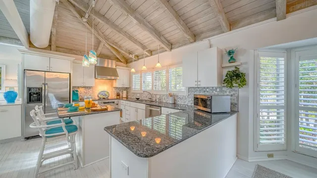 a kitchen with granite countertop lots of counter top space