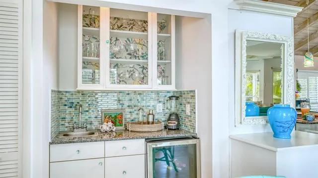 a kitchen with a sink and a window