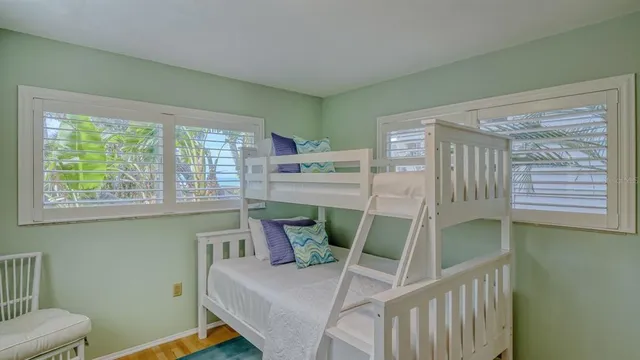a front view of a house with a large window