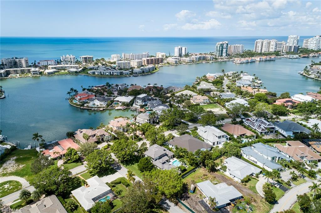 3170 Crayton Road Naples, FL 34103 - Photo 44 of 50 a view of a city and ocean view