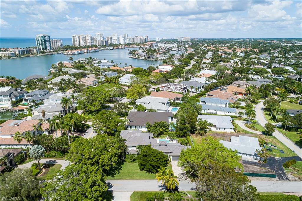 3170 Crayton Road Naples, FL 34103 - Photo 46 of 50 an aerial view of multiple house